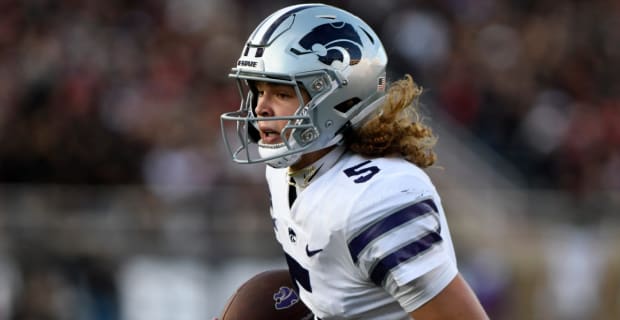 Kansas State Wildcats quarterback Avery Johnson on a rushing attempt during a college football game in the Big 12.